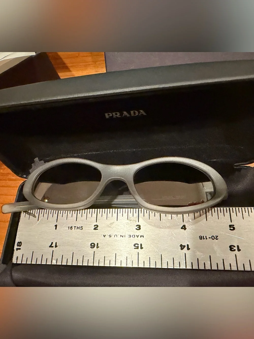 Prada Kids Oval Sunglasses in Light Gray with Dark Lenses